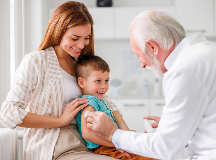 Doctor giving vaccine to child