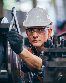 Industrial Engineer Fixing Gears