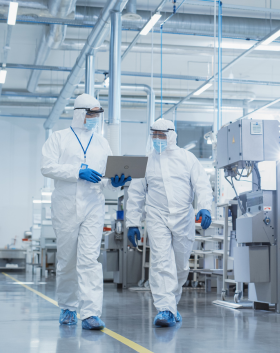 Sterile Compounding Pharmacy workers with laptop-1