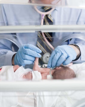 baby in incubator-300